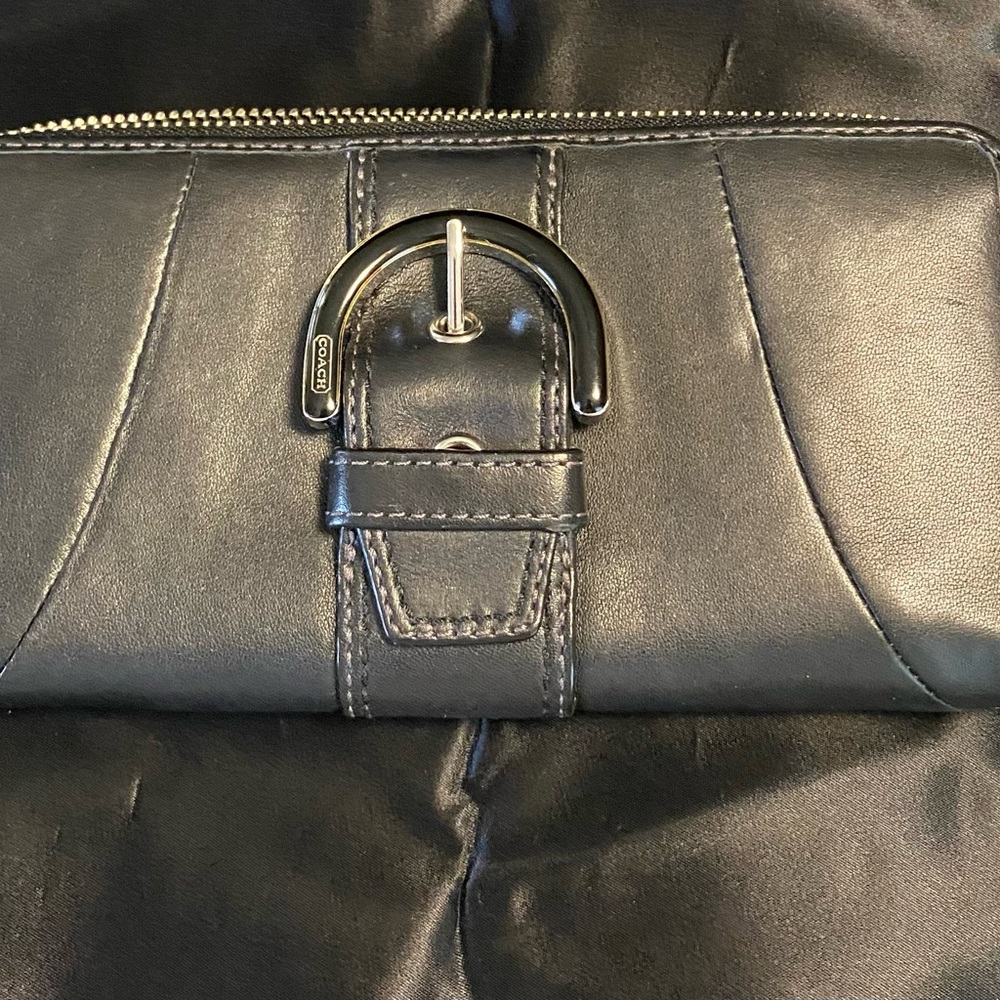 Coach black leather wallet.
